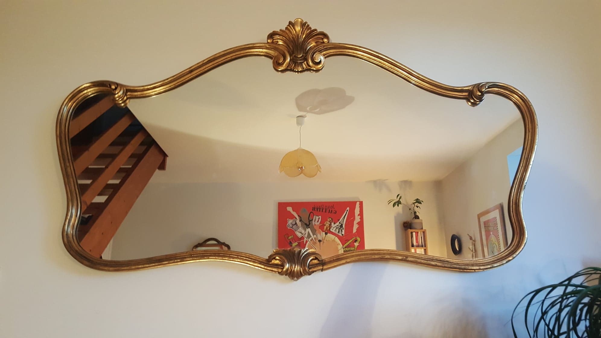 Mirror with golden mouldings