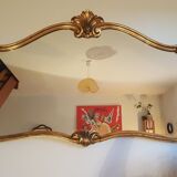 Mirror with golden mouldings