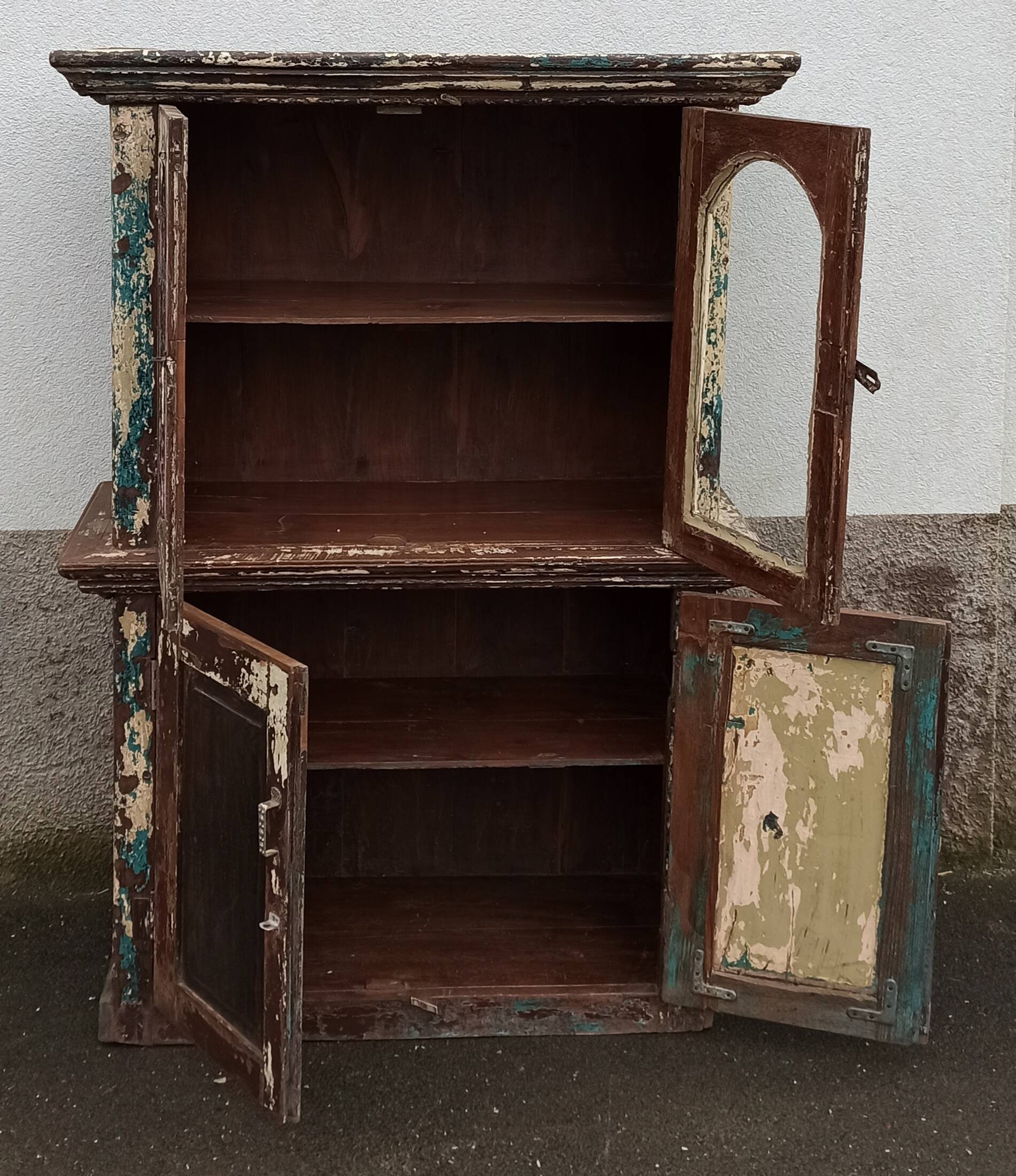 Old patinated wooden glass cabinet