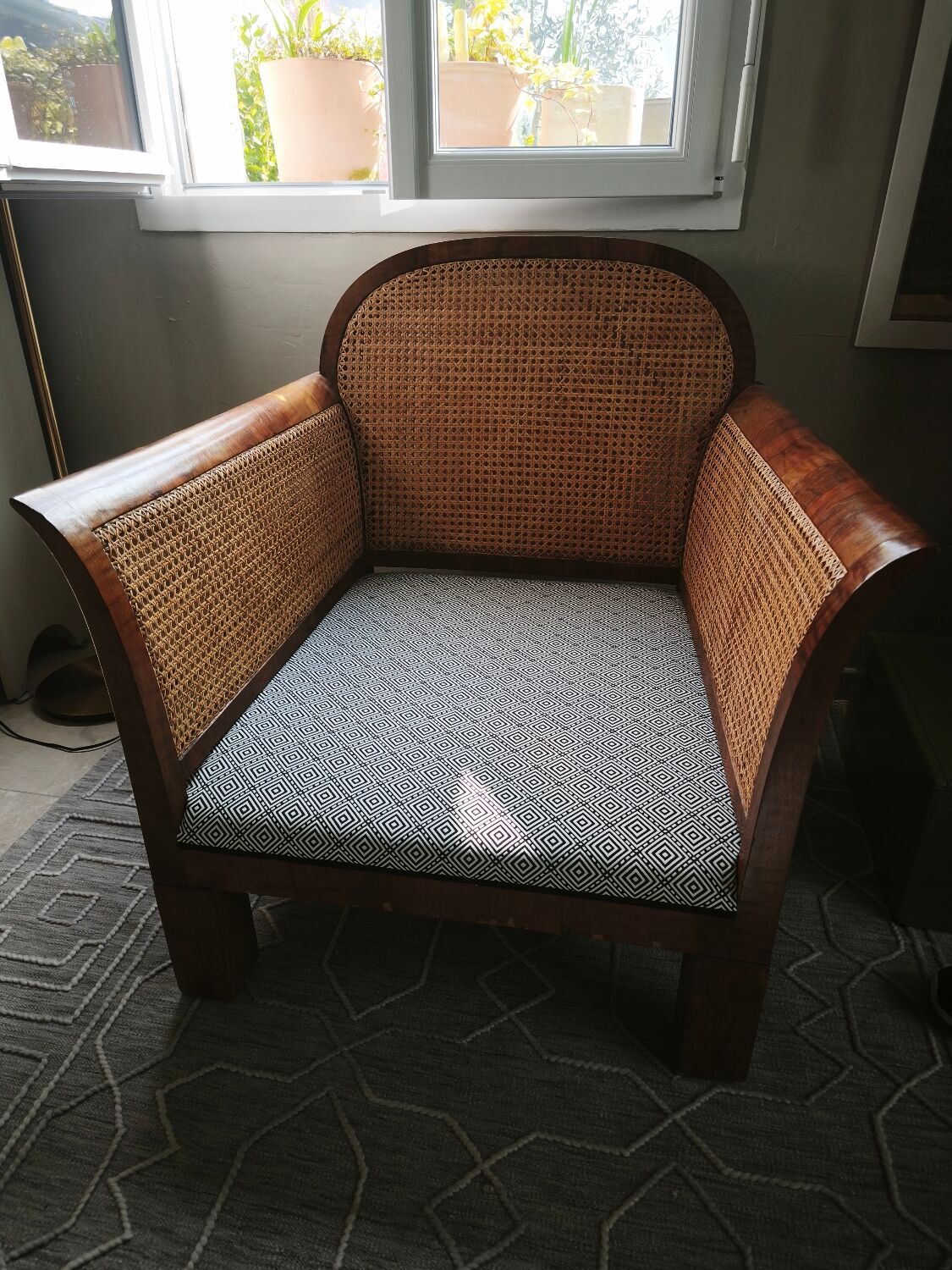 double caned armchair
