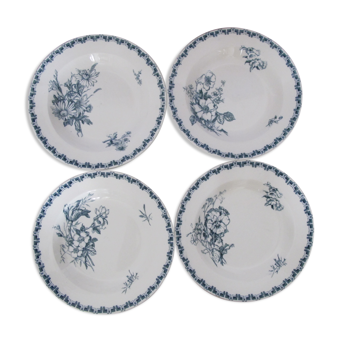 Set of 4 hollow plates in Iron Earth of Sarreguemines, model "Linnée".