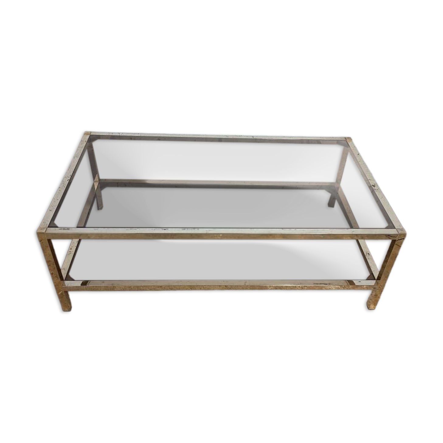 1970s coffee table in brass with a double smoked glass top.