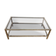 1970s coffee table in brass with a double smoked glass top.
