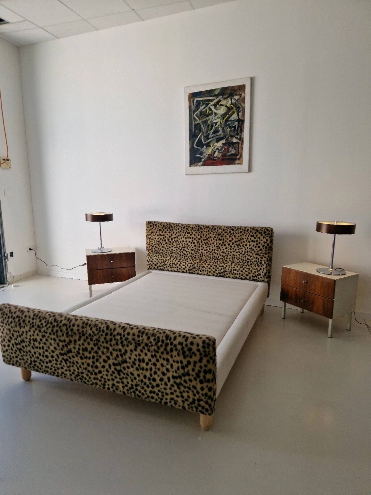 Vintage leopard print bed frame, Hollywood Regency style.