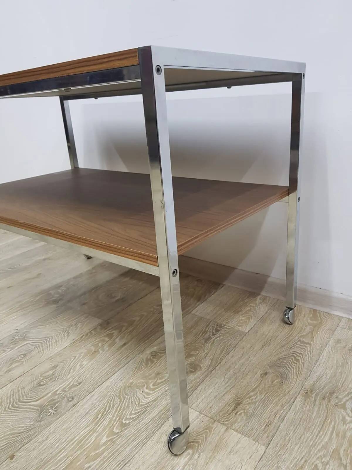 Mobile side table, brown, veneer, chrome-plated steel, Germany, 1970s.