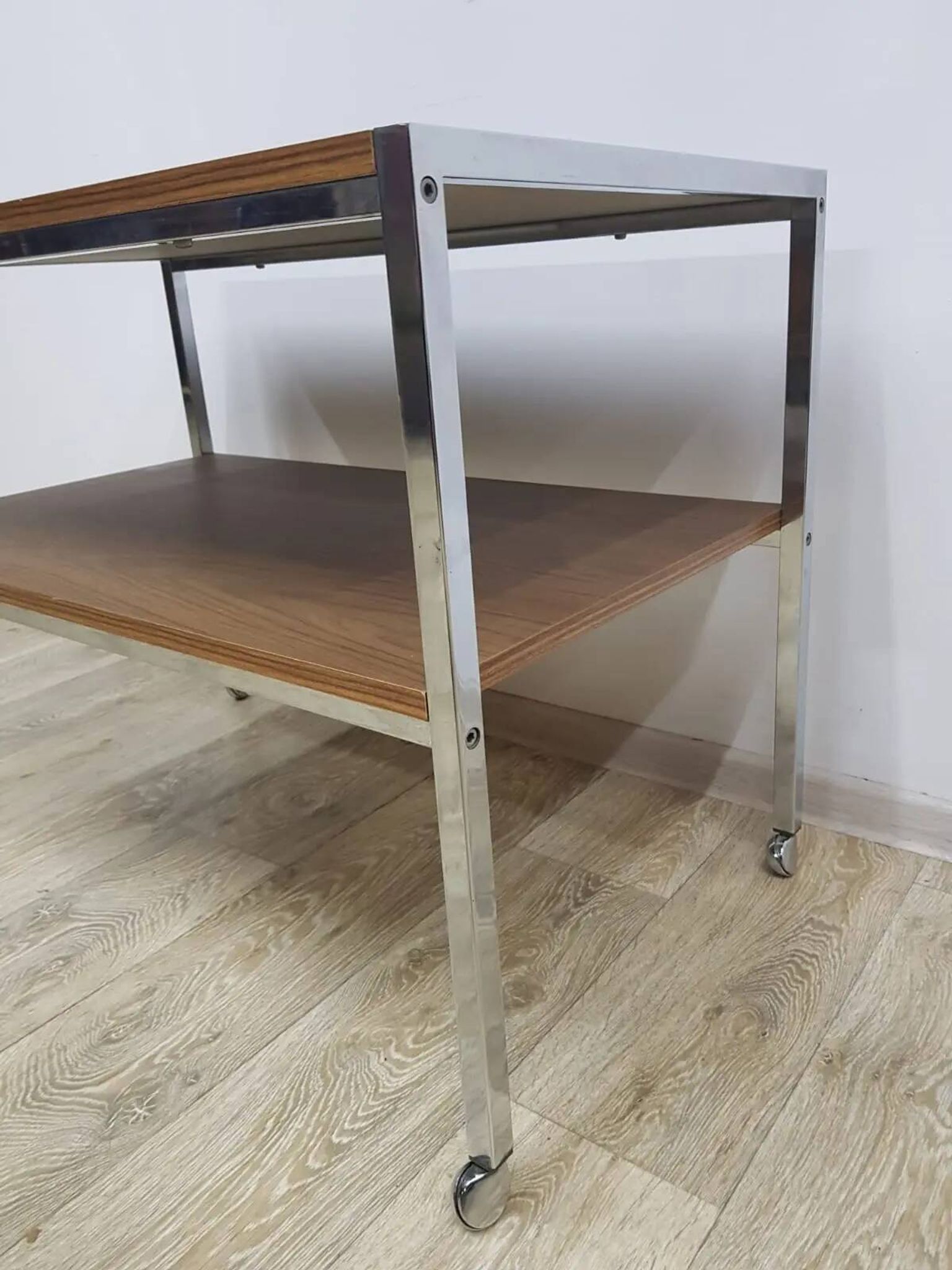 Mobile side table, brown, veneer, chrome-plated steel, Germany, 1970s.