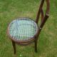 Chair with blue wire braided seat