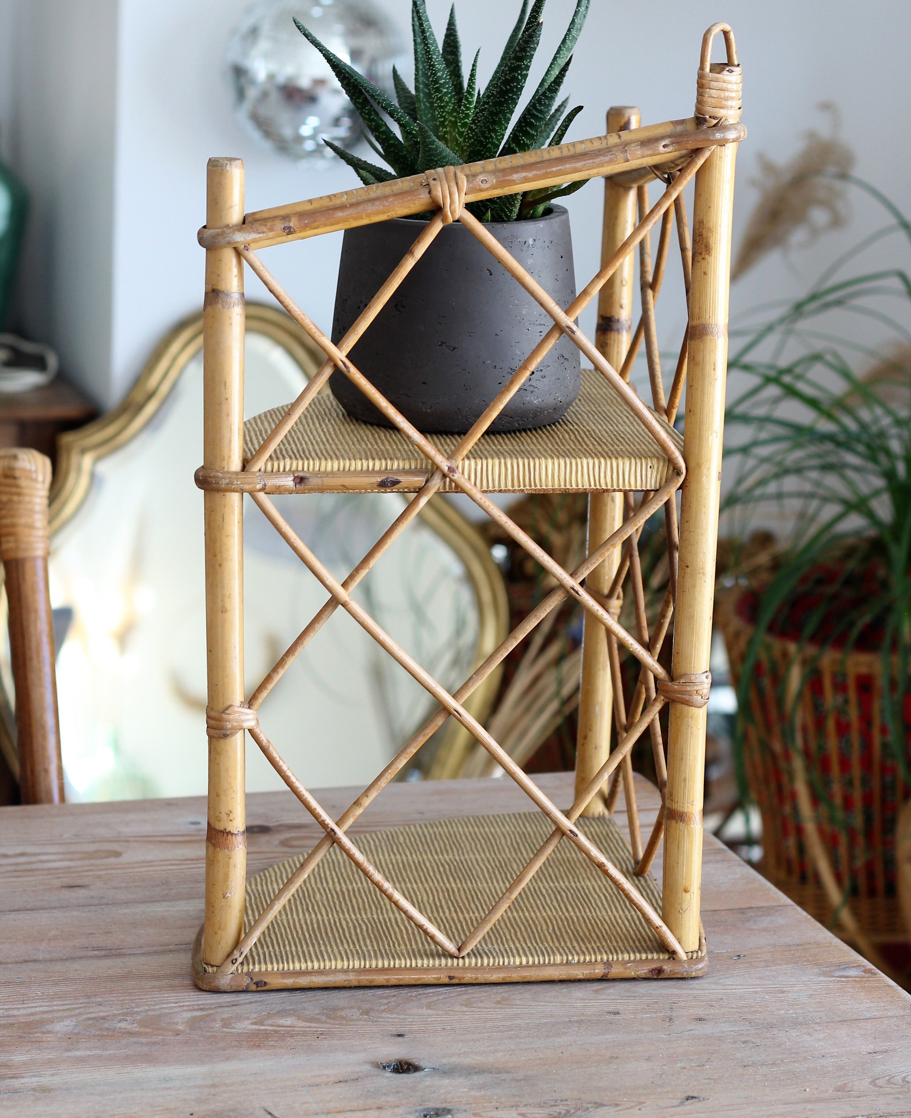 Rattan corner shelf