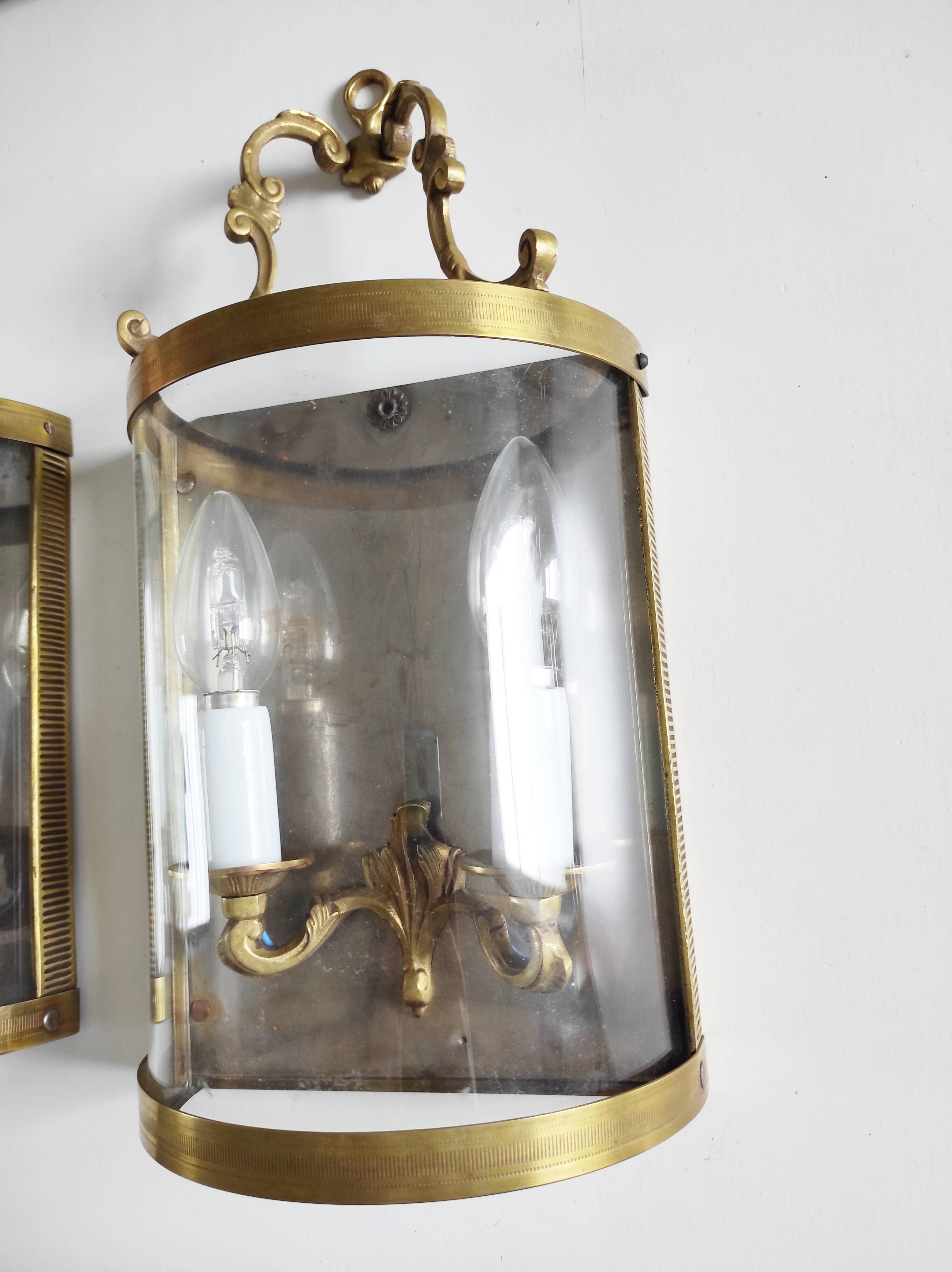 Pair of two-light wall sconces