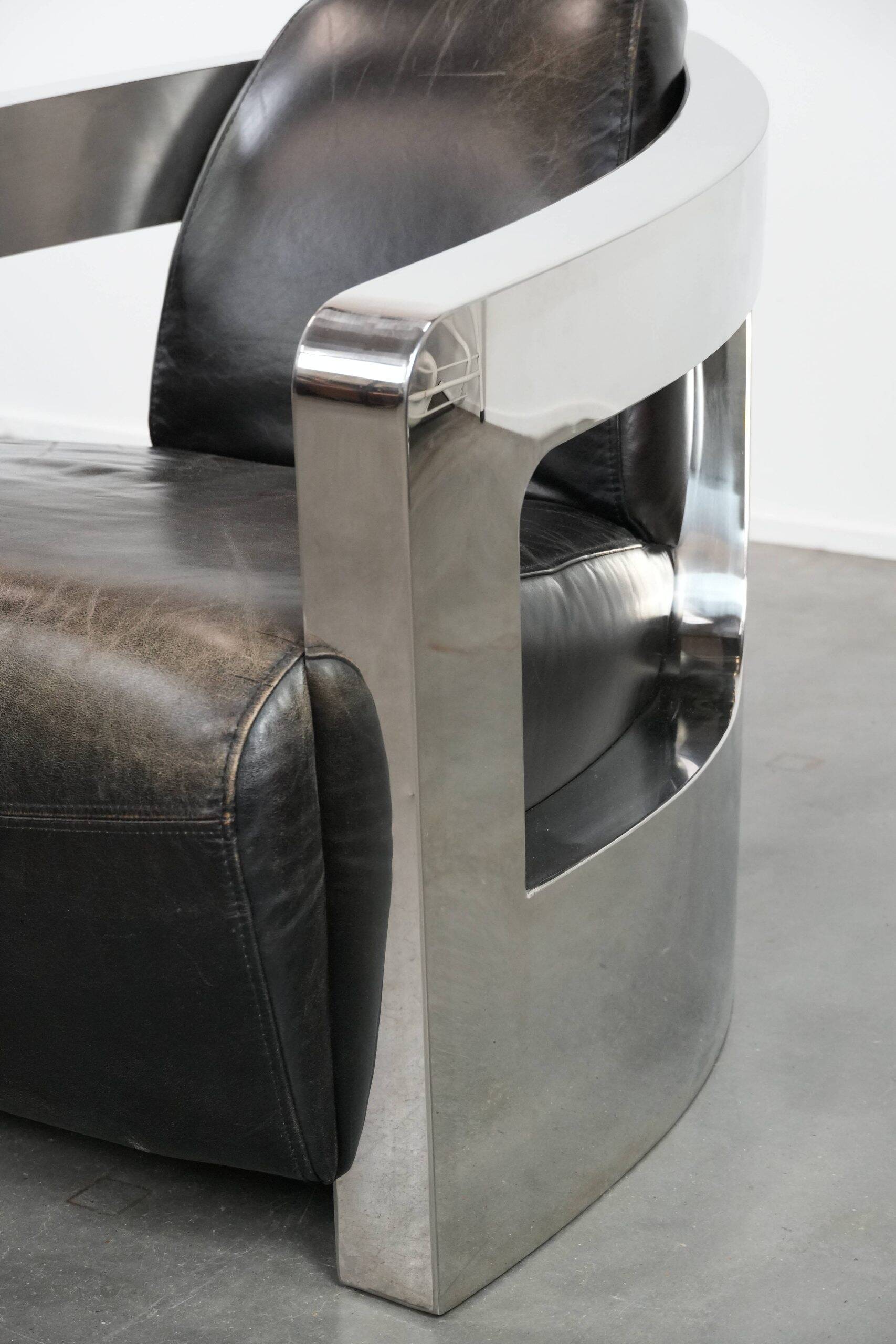 Unique design Aviator armchair with an aluminium frame