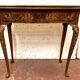 Table a jeu de style Louis XV en marqueterie Hollandaise XIX siècle Console