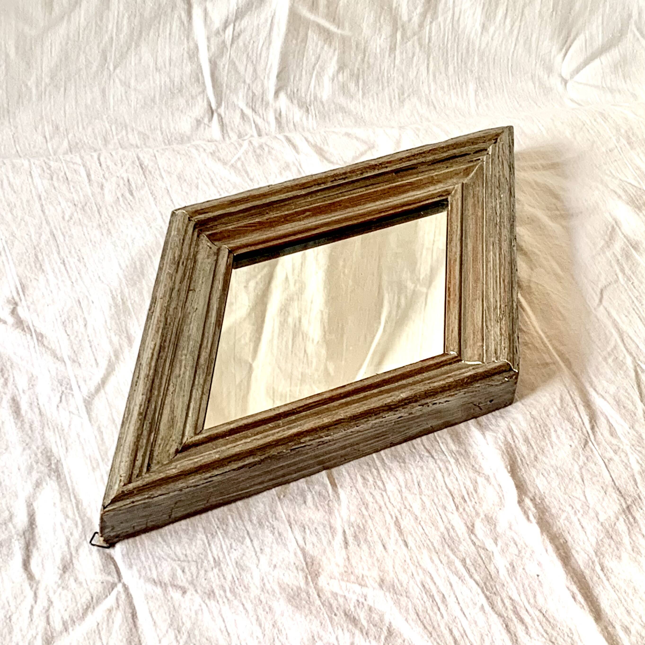 Small vintage wooden diamond wall mirror