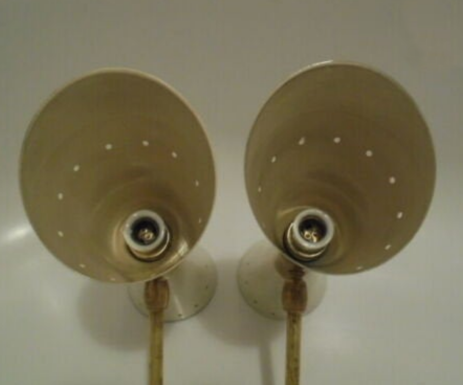 Pair of wall sconces remembering the Italian creations from the 50s and 60's