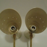 Pair of wall sconces remembering the Italian creations from the 50s and 60's