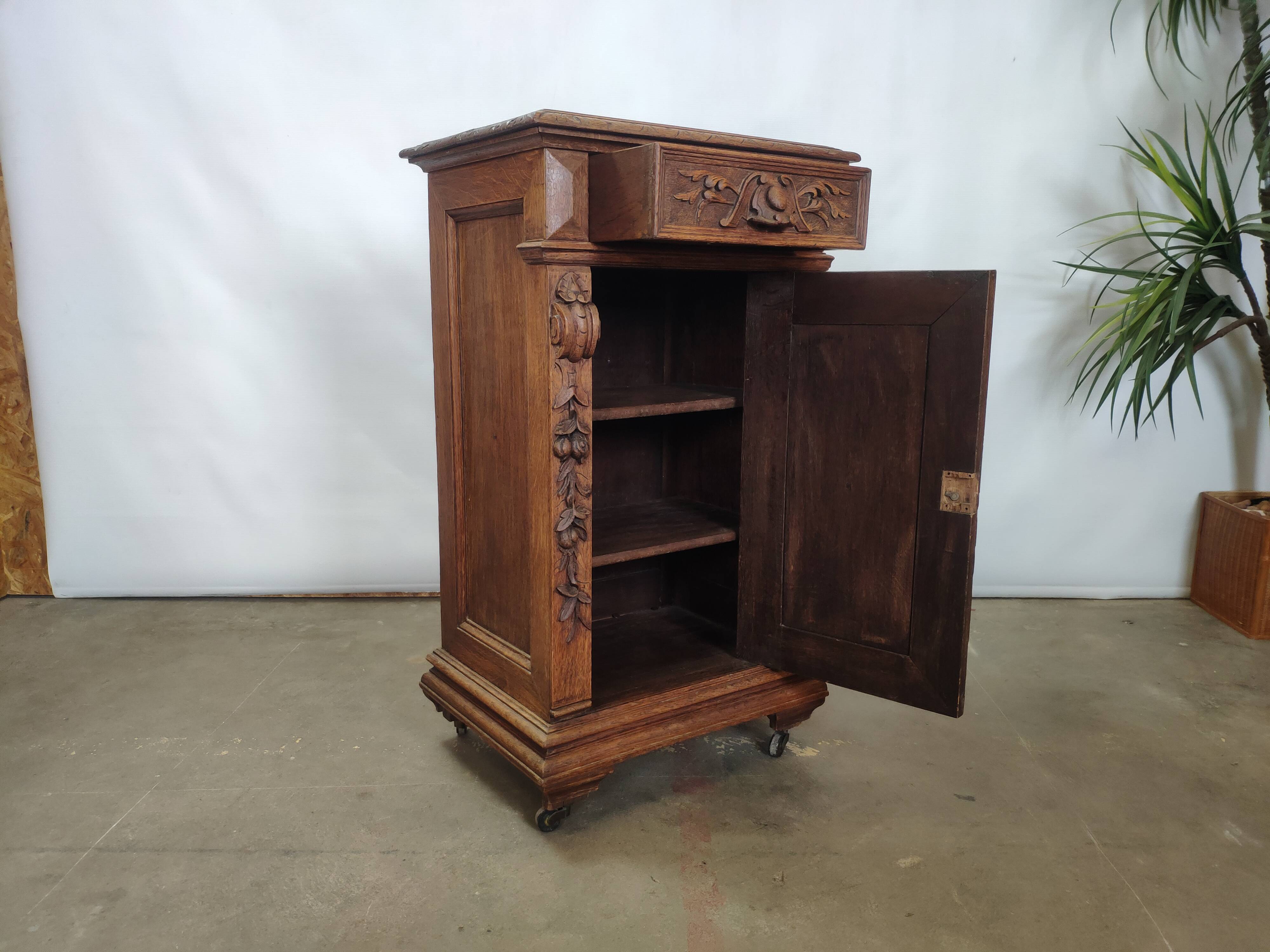 Bedside table carved in oak