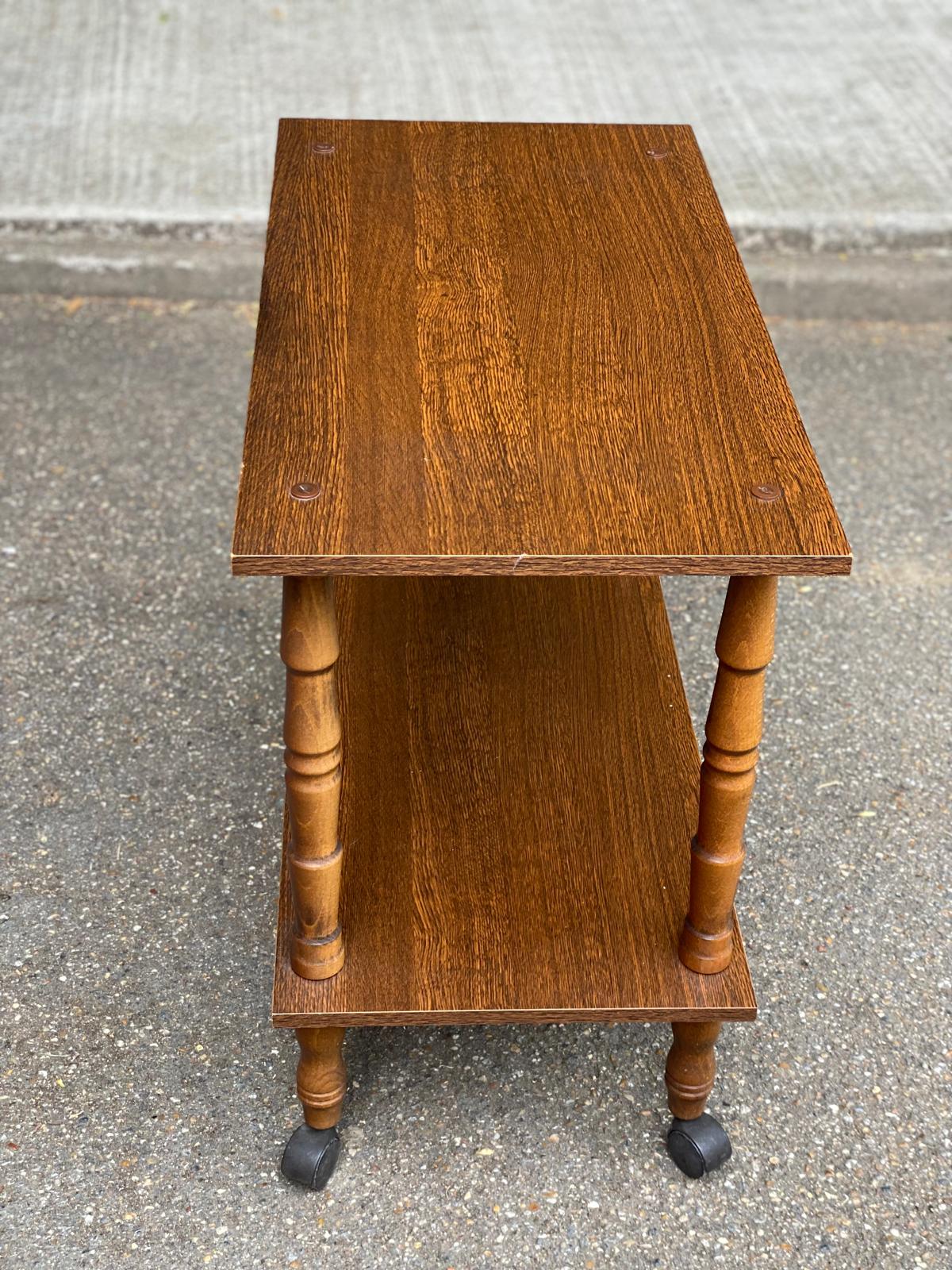 Vintage wooden rolling dessert trolley from the 1980s.
