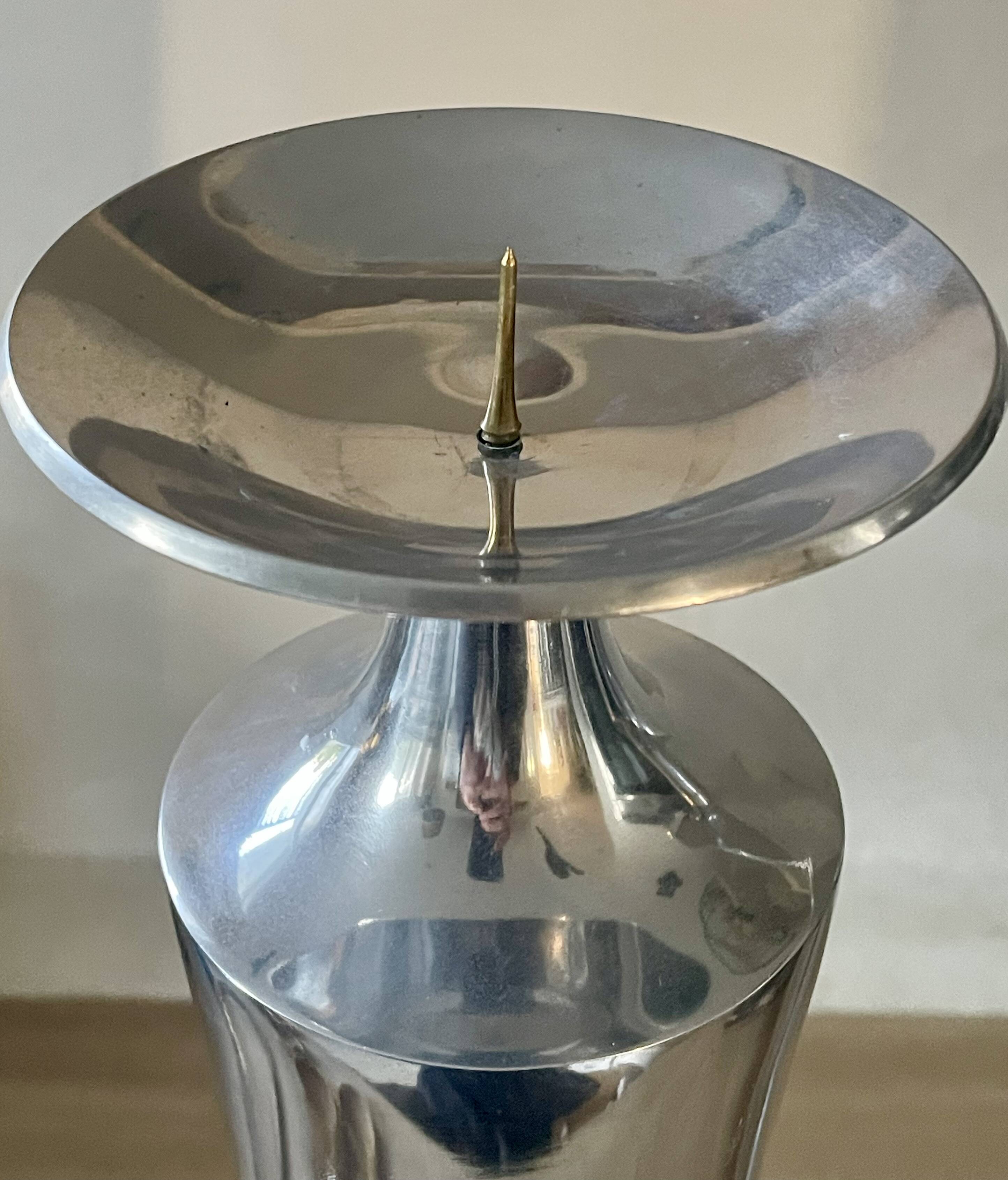 Pair of aluminium cast candle holders 52cm