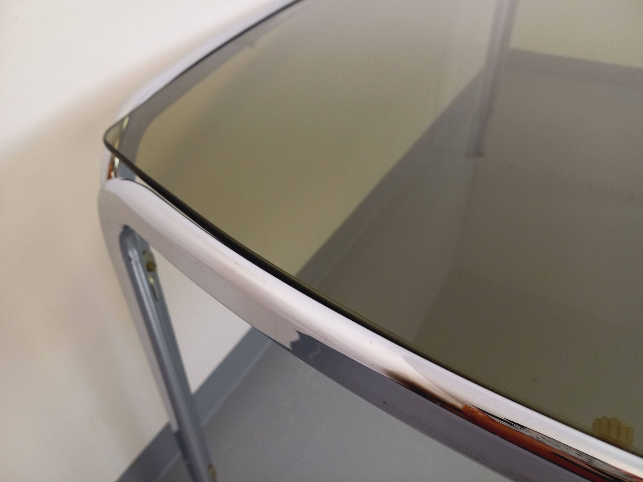 Vintage curved rectangular dining table in smoked glass and chrome metal