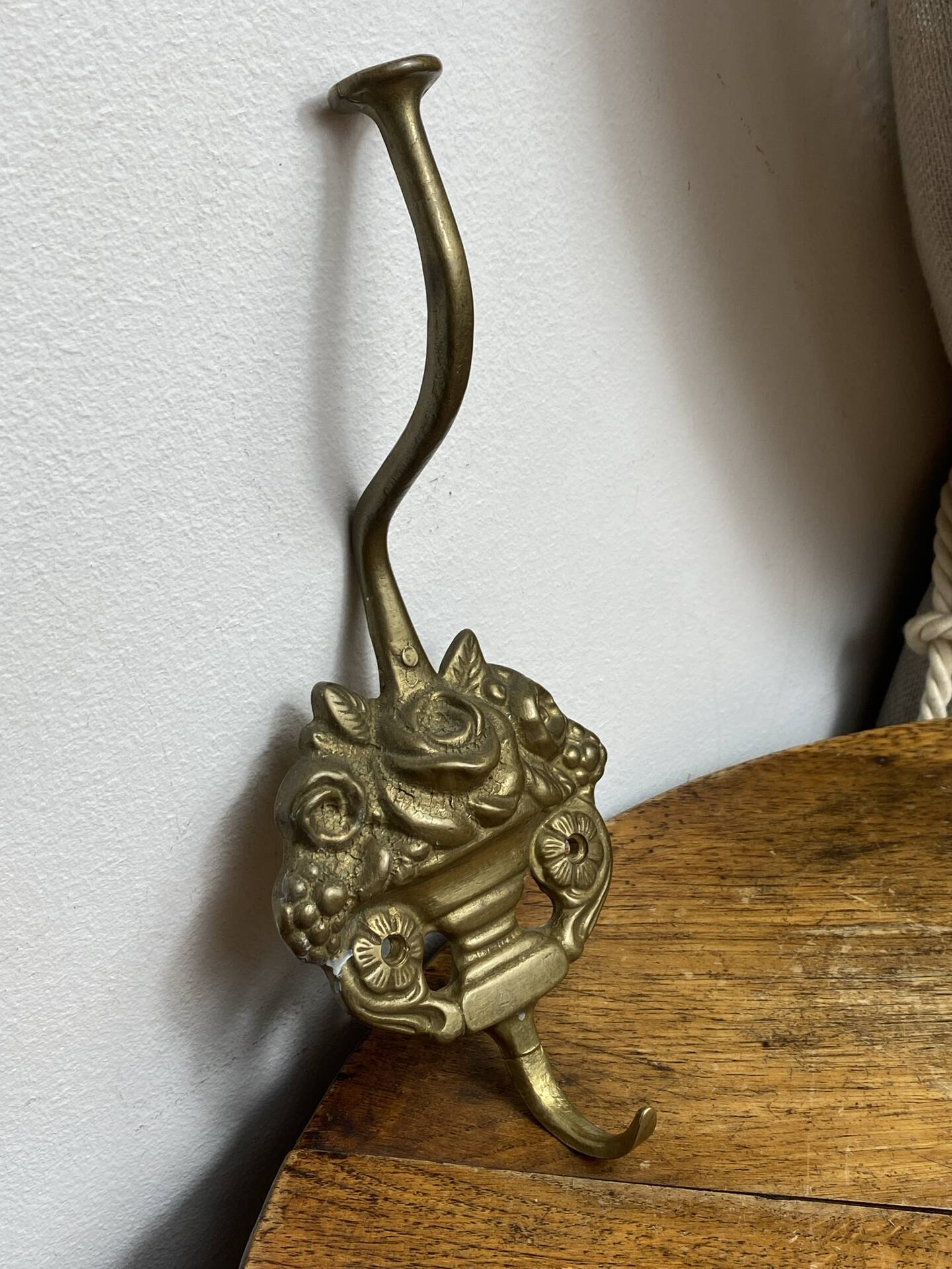 Wall-mounted brass hook