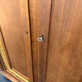 Rattan wardrobe with compass feet