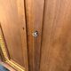Armoire rotin pieds compas