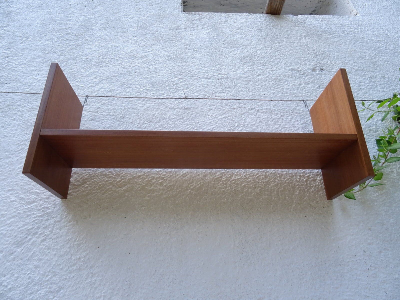 Pair of teak wall shelves