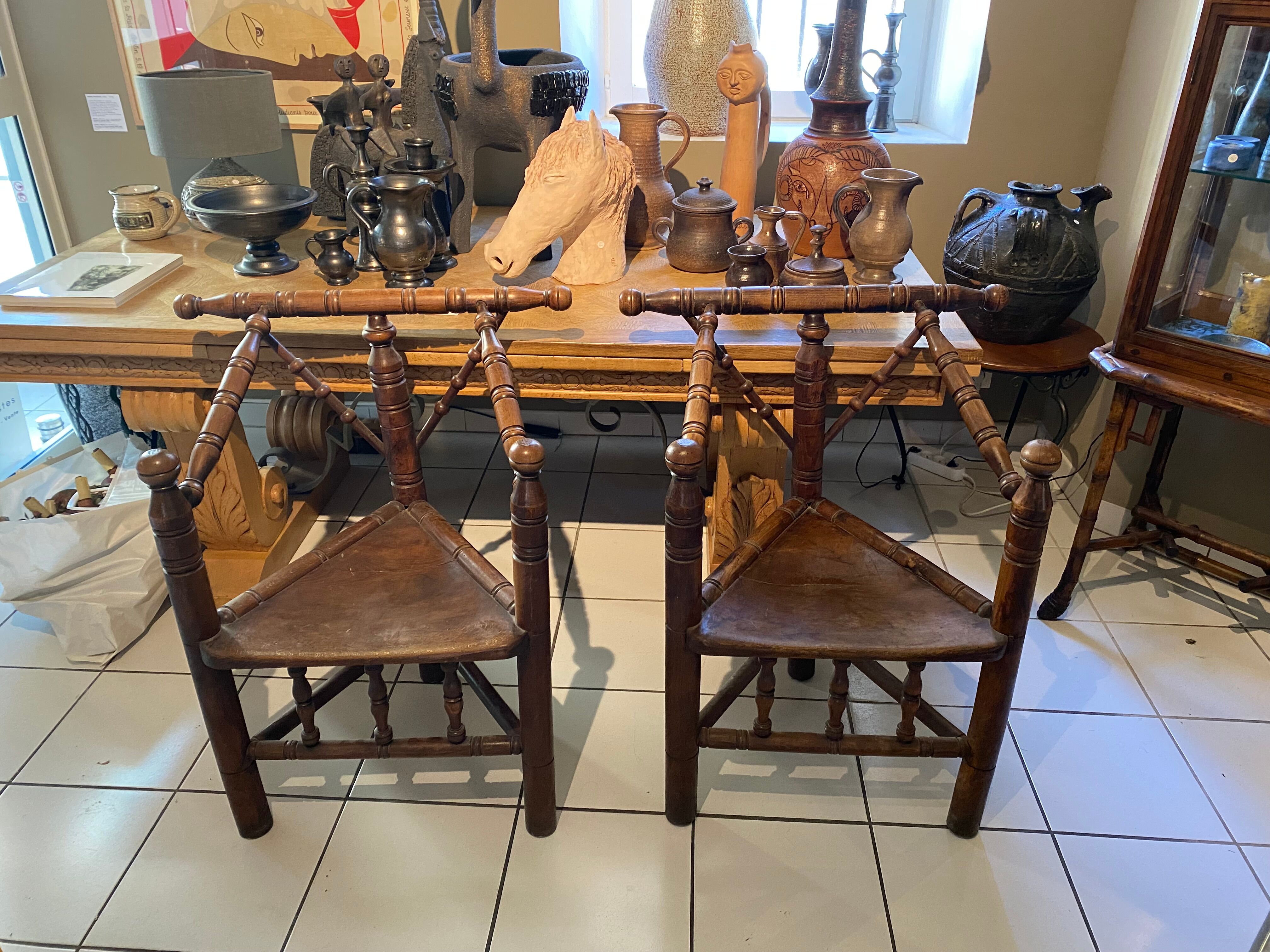 Pair of tripod turner chairs