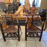Pair of tripod turner chairs