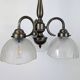 Antique Art Deco chandelier with 3 arms in patinated metal and ribbed glass.