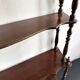 Large Napoleon III shelf in turned wood with a pediment.