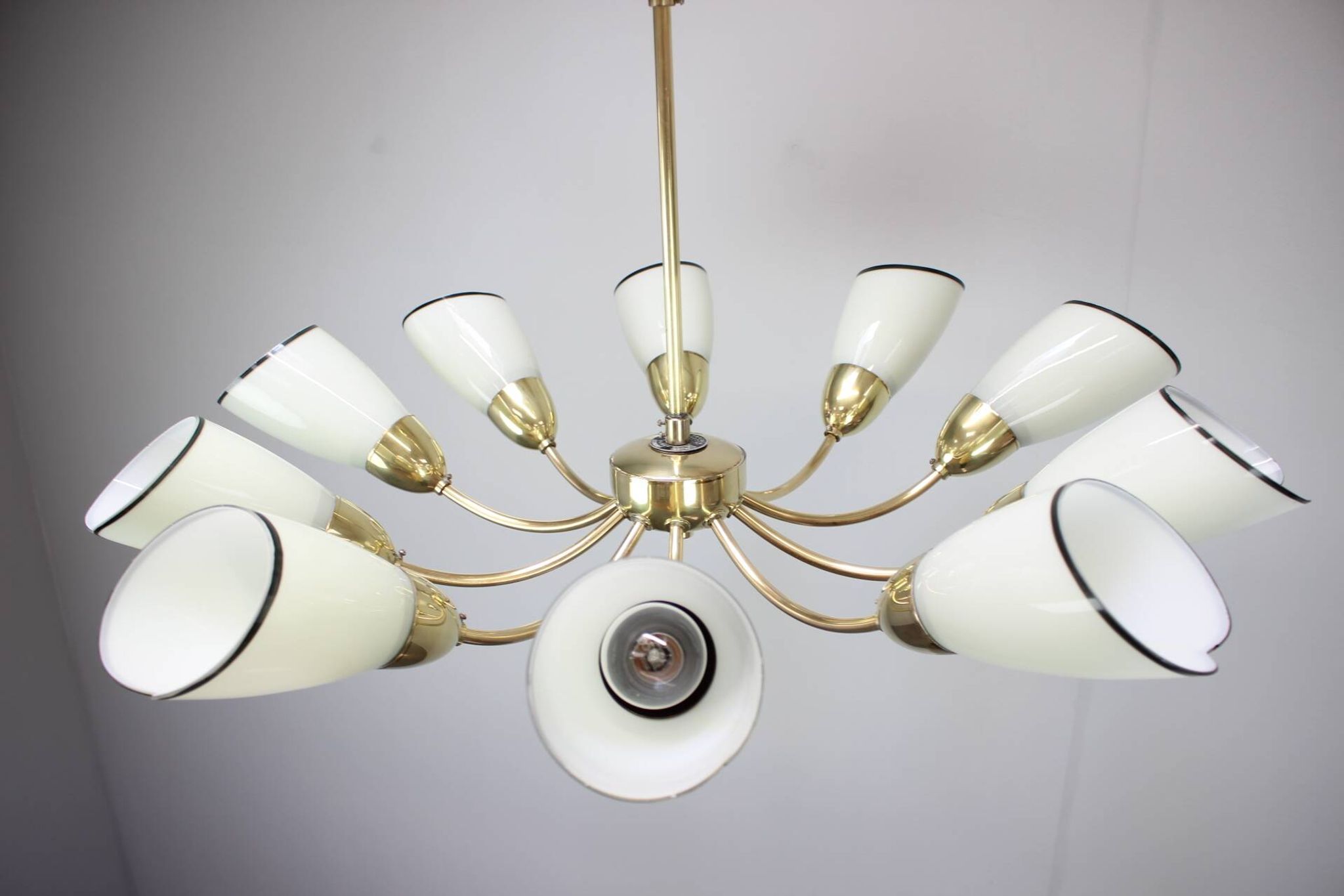 Brass and glass ten-arm chandelier from the mid-century, 1960s.