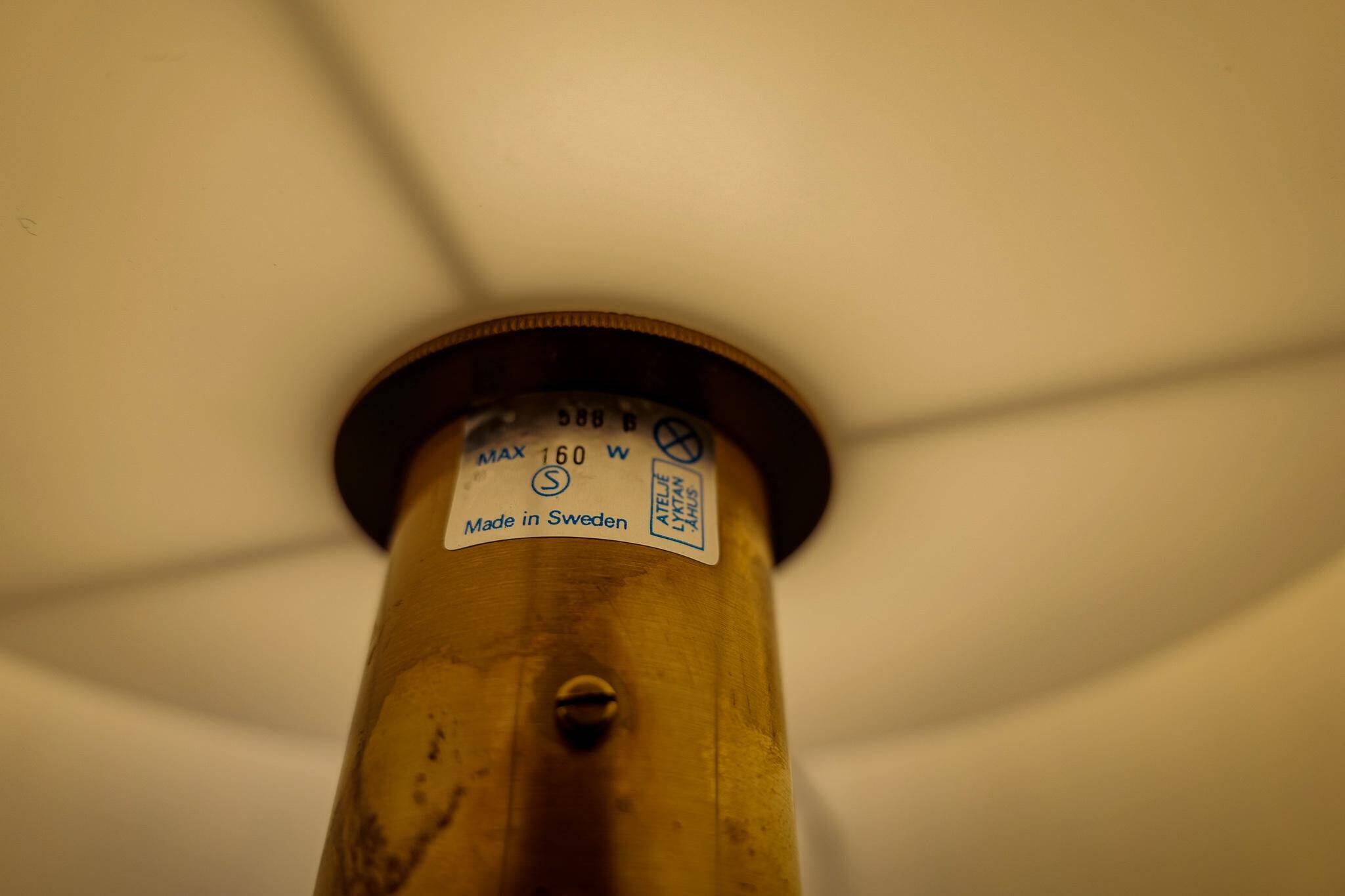 Modern mid-century brass and leather floor lamp Atelje Lyktan, Sweden