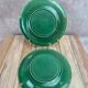 Set of 2 green earthenware dessert plates with vine decoration.