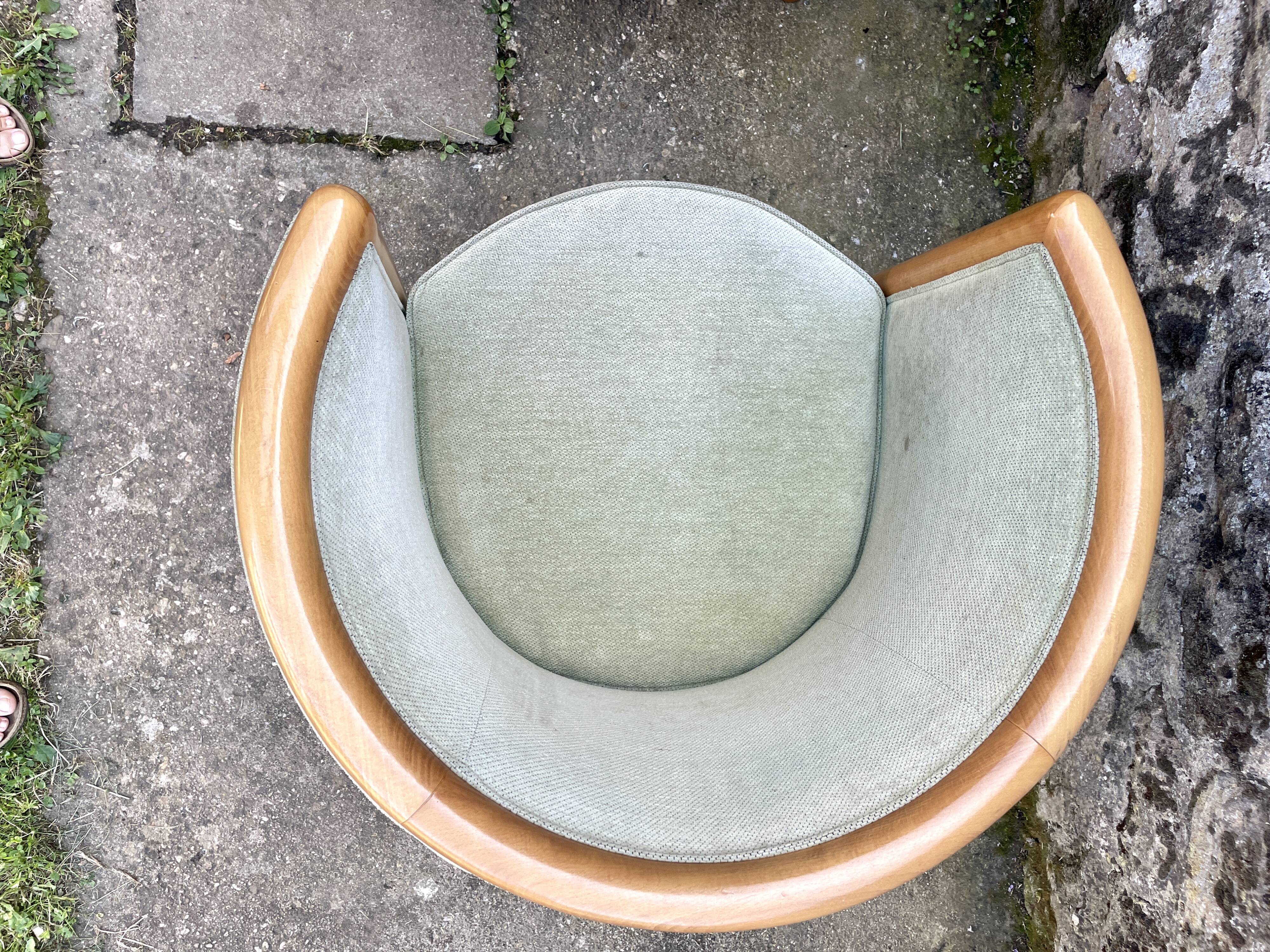 Pair of barrel-shaped armchairs in beech and almond green velvet by Maison Rosello