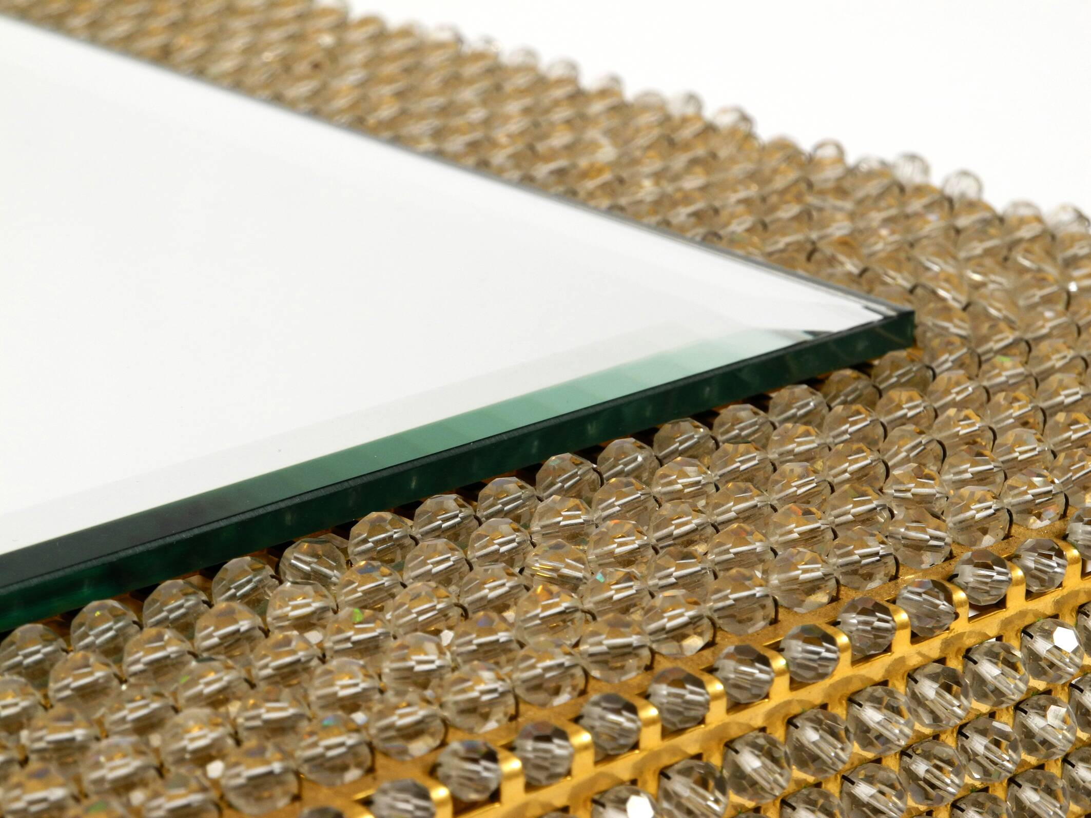 1960s brass wall backlit mirror, frame with glass beads by Palwa