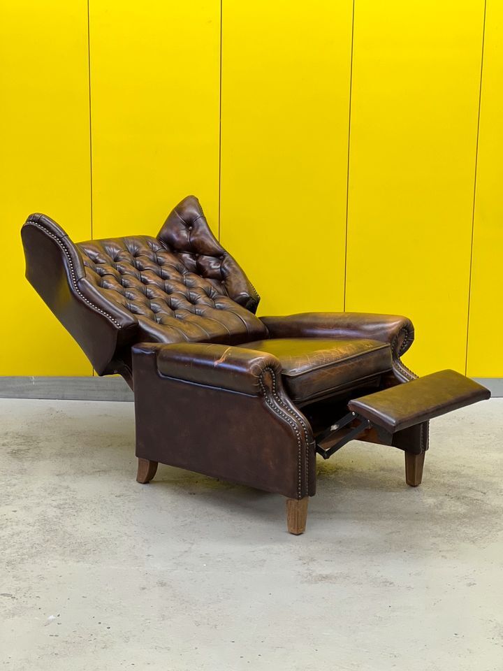 Brown vintage handmade chesterfield recliner armchair