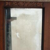 Art Deco door mirror with floral pattern frame