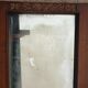 Art Deco door mirror with floral pattern frame