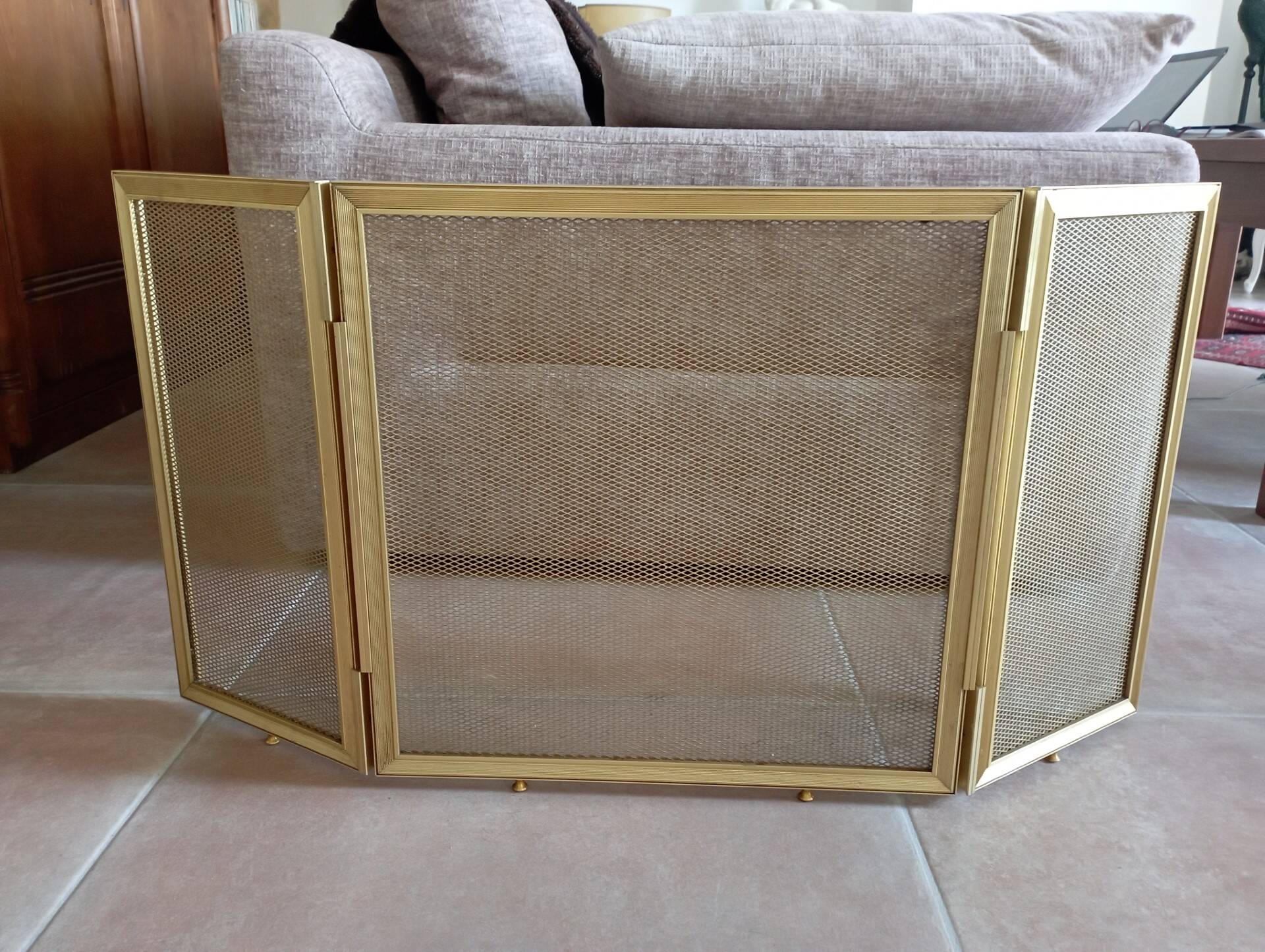 Gold metal fire screen