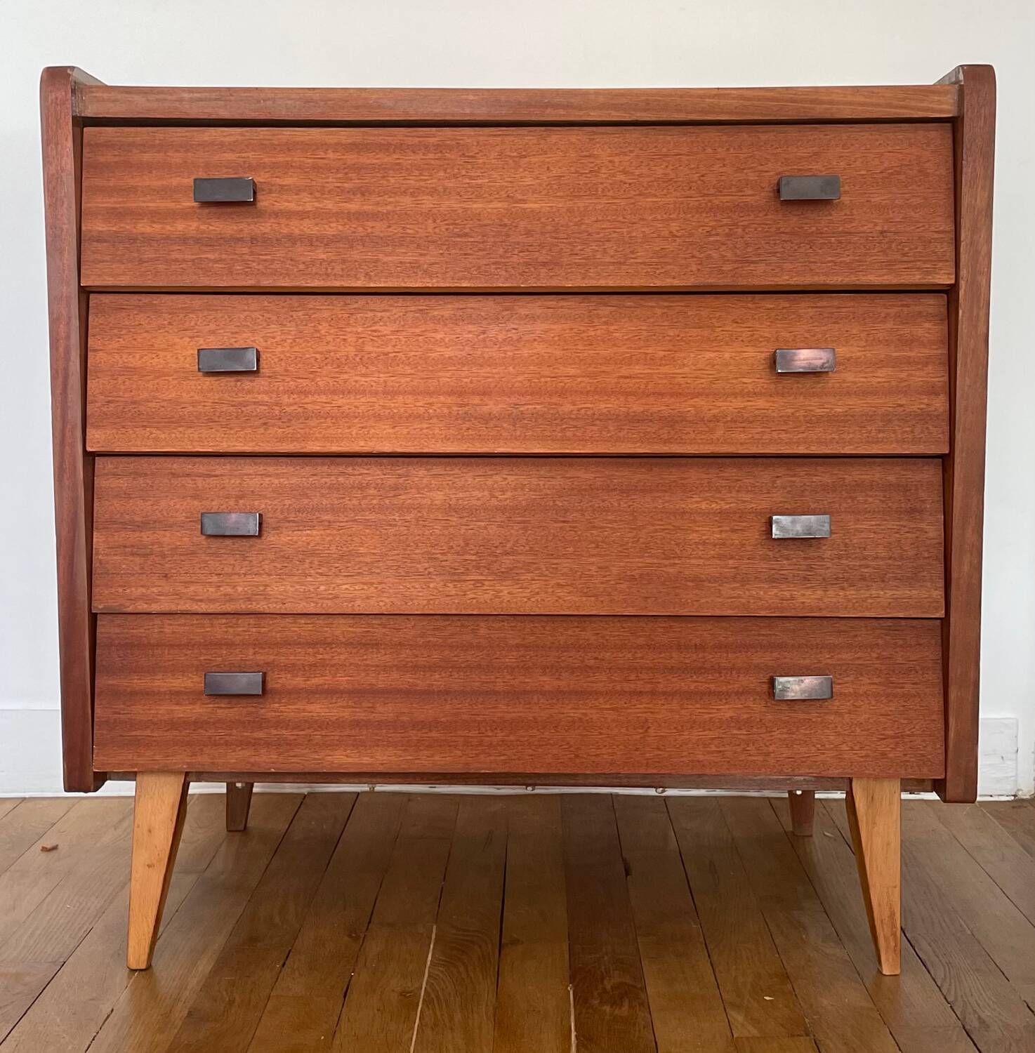 Vintage wooden chest of drawers with compass legs