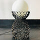 Lampe en fer forgé noir et globe en verre blanc