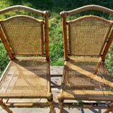 Duo of wooden chairs turned bamboo style