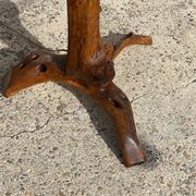 Floor lamp in solid olive wood, Brutalist style, French work from the 1970s.
