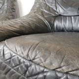 Pair of black leather armchairs from the 80s