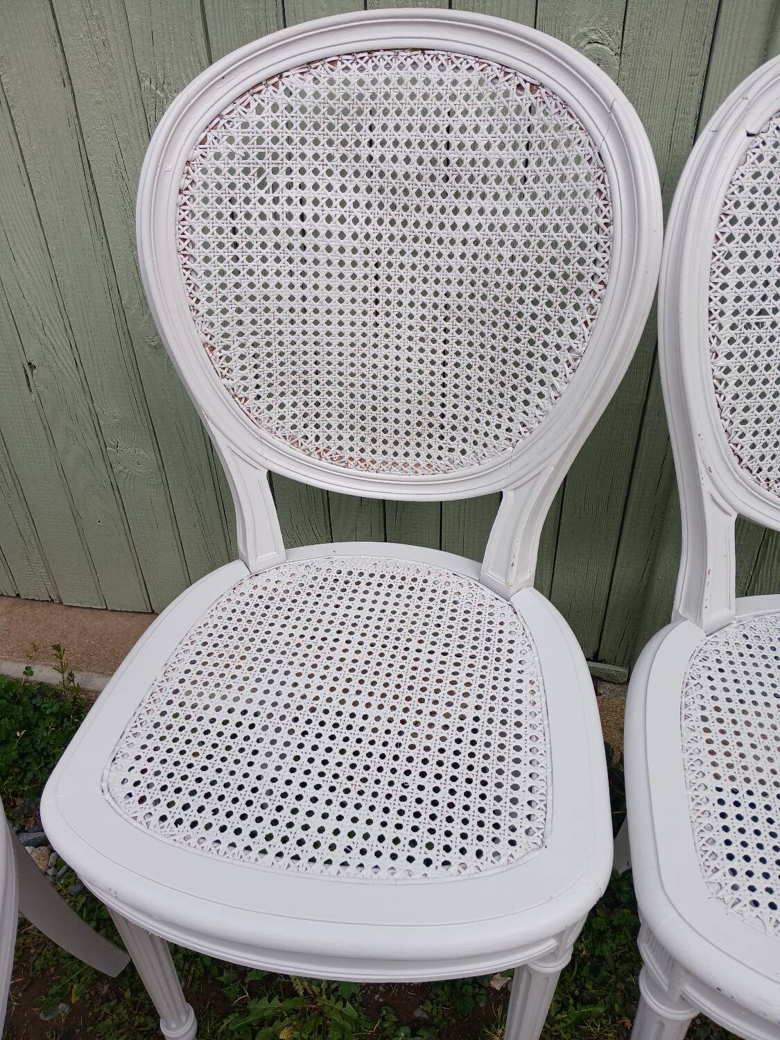 4 old wooden and cane chairs