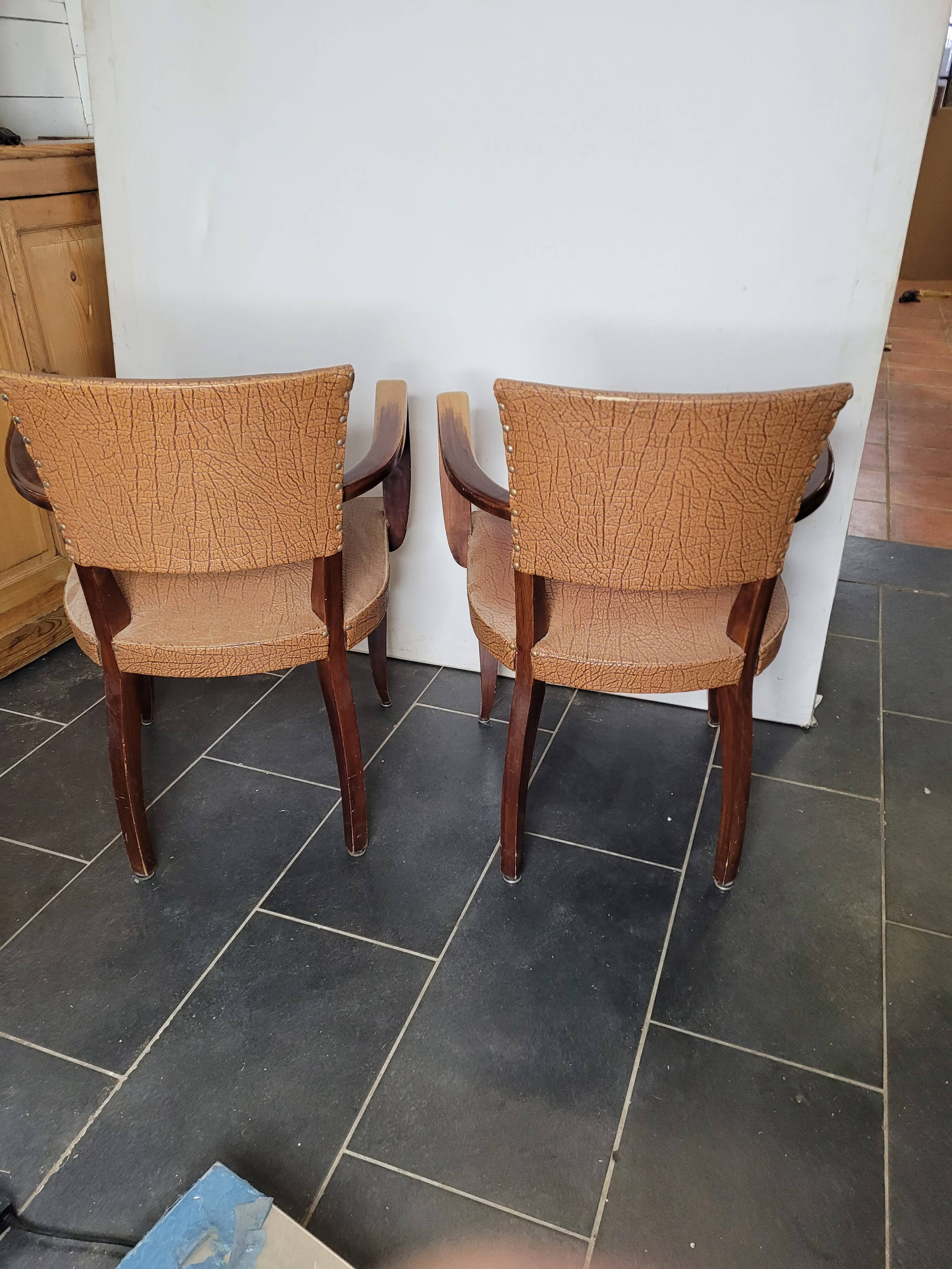 Pair of skai bridge armchairs