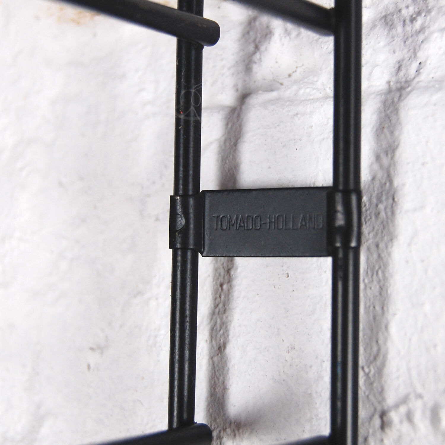 Vintage Tomado wall shelf by A. Dekker 1960s