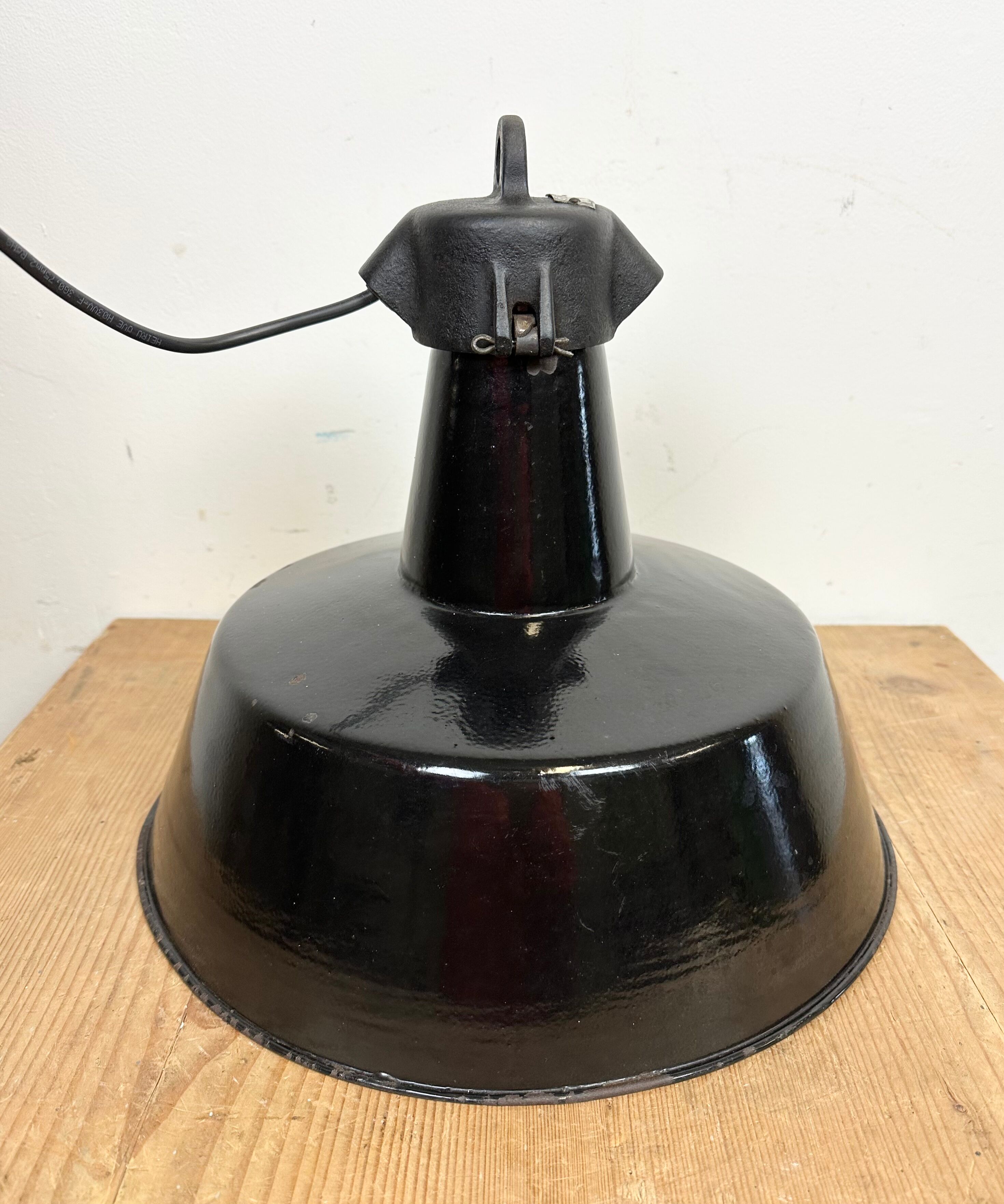 Industrial black enamel factory lamp with cast iron top, 1960s