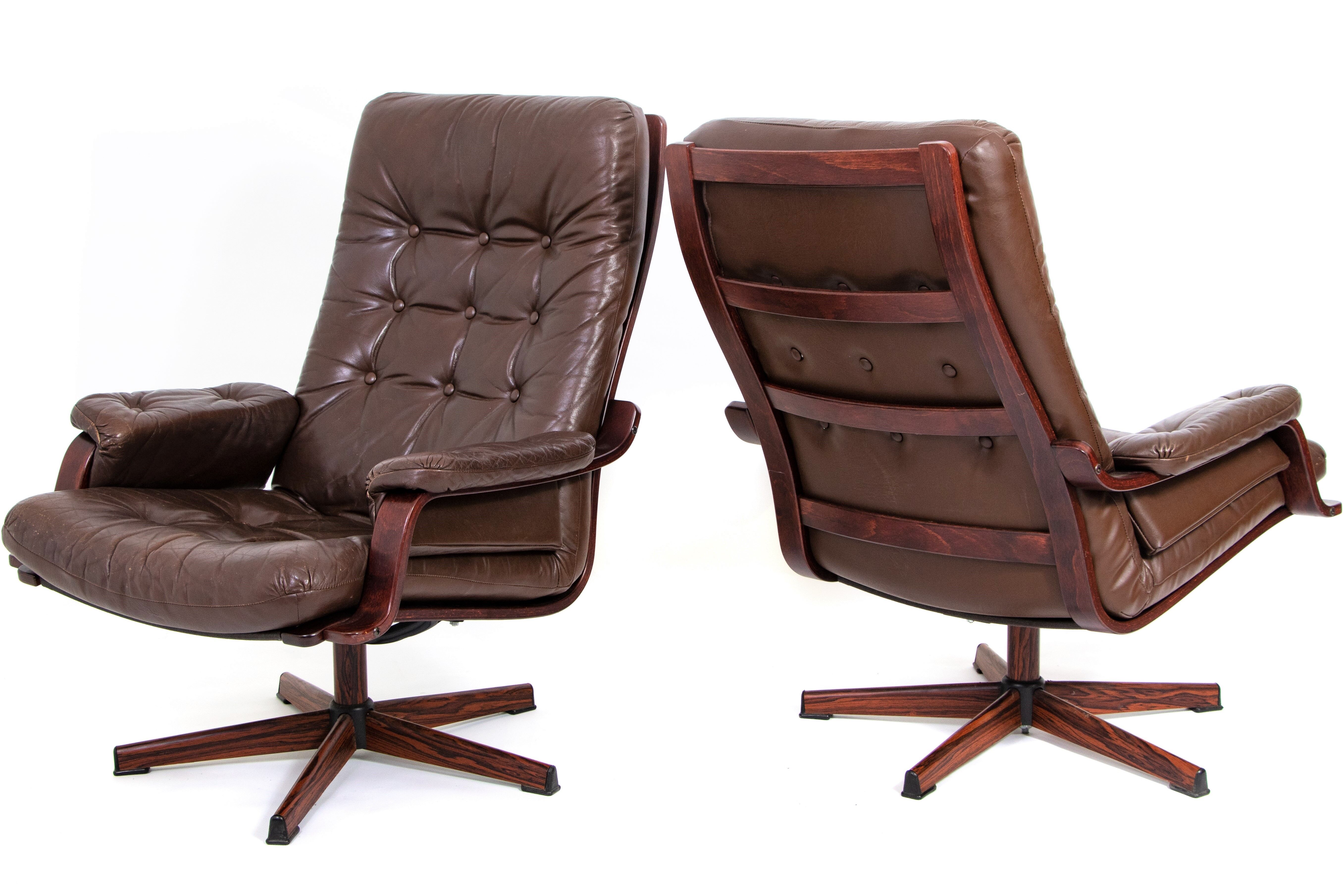 Pair of 2 Swedish swivel leather chairs
