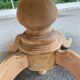 Round dining table with a central pedestal, extendable, stripped in solid walnut with 2 extensions.